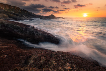 Obraz premium Sunset in the basque coast under Jaizkibel mountain in Hondarribia, Basque Country.