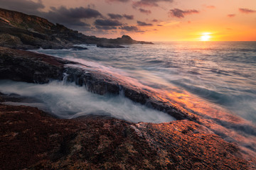 Sunset in the basque coast under Jaizkibel mountain in Hondarribia, Basque Country.