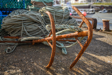Anchors for Lobster and Crab pots laying on the quayside