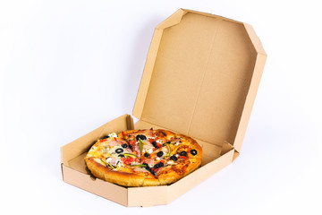 Fresh pizza inside delivery box, isolated on white background.