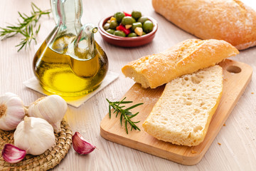 rustic bread and olive oil ready to make toasts