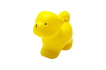 Image of an Old children's Plastic toy dog isolated on a white background