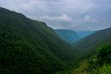 Naklejka premium mountain landscape with clouds