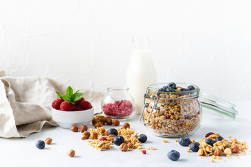 Healthy breakfast set on grey background. The concept of delicious and healthy food. Top view, copy space.