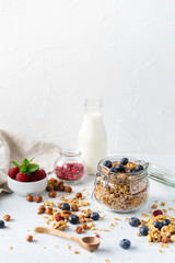 Healthy breakfast set on grey background. The concept of delicious and healthy food. Top view, copy space.
