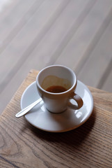 cup of fresh espresso in a coffee shop