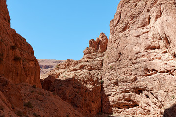 Fototapeta premium Todra Gorge, a canyon in the High Atlas Mountains in Morocco, near the town of Tinerhir. One of the most spectacular canyons in the world, In some places the walls of the ravine reach a height of 400m