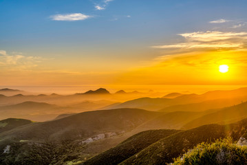 Sunset over the Mountains with Sun 