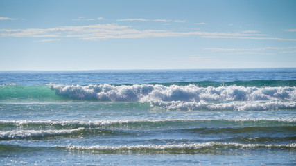 Fototapeta premium Waves at the beach on the Westcoast, New Zealand