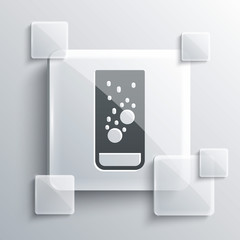 Grey Effervescent aspirin tablets dissolve in a glass of water icon isolated on grey background. Square glass panels. Vector