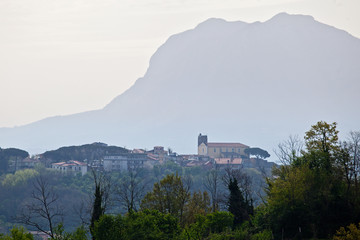 Fototapeta na wymiar typical country of southern Italy. Montefredane, Avellino, Irpinia, Campania, Italy. The castle of Montefredane with the mount of Chiusano on the background.