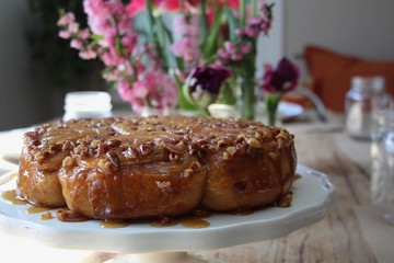Homemade cinnamon rolls, floral background
