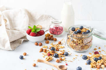 Healthy breakfast set on grey background. The concept of delicious and healthy food. Top view, copy space. 