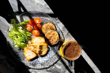 healthy Breakfast with vegetables. The morning light illuminates the Breakfast with coffee. The view from the top. A healthy diet