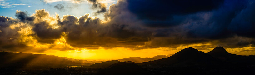 Panorama of Silhouetted Mountains with Clouds, Sunset 