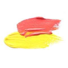 .two strokes of red and yellow thick acrylic paint. place for text. isolate on a white background..