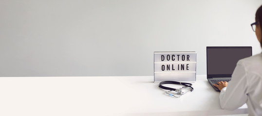 Online doctor concept. Doctor online medical help having a patient video call at home