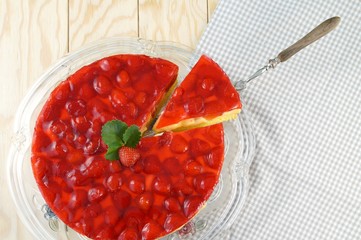 Homemade tasty Strawberry and cream sponge cake. Delicate and delicious biscuit cake with Yogurt cream and strawberries. Beautiful birthday cake 