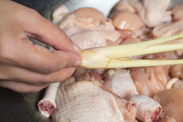 Preparing grilled chicken with vegetables