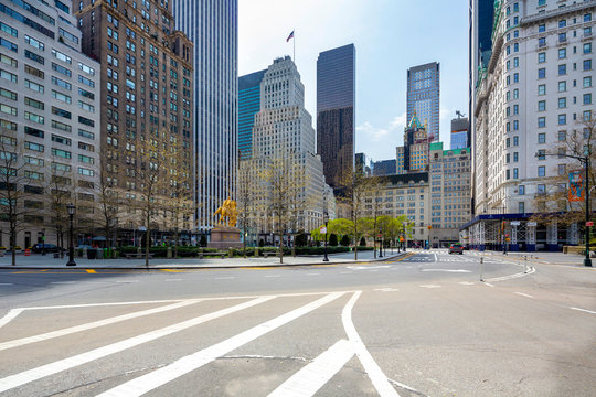NEW YORK CITY - Apr 17: Grand Army Plaza in New York on April 17; 2020. Grand Army Plaza lies at the intersection of Central Park South and Fifth Avenue in front of the Plaza Hotel in Manhattan.