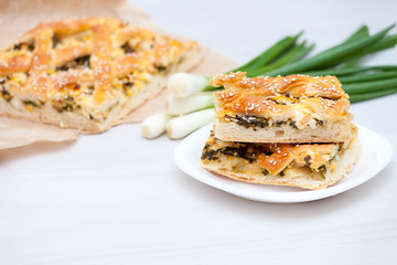 Spinach pie or spanakopita with spinach, cheese, eggs, onion.