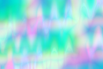 An abstract psychedelic iridescent blur background image.