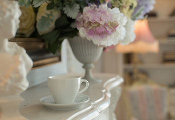 Cup of coffee in cafe after quarantine. Cup of herbal tea on the table early morning. Drink some coffee alone and relax after a long difficult day.