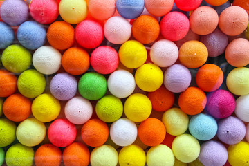 Detail of colourful balls of stitch line.