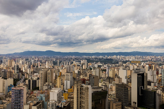 View Of Copan Building In Sao Paulo With Buildings And A Big Mountain In The Background
