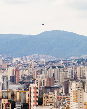 View Of Copan Building In Sao Paulo With Buildings And A Big Mountain In The Background