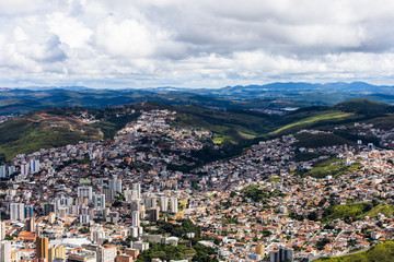 View of city of Poços de Caldas in Minas gerais in Brazil with beautiful and colorful mountains