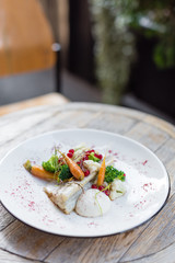 Poached White Fish with Steamed Vegetables and Berries