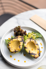 Grilled Avocado with Lettuce and Spicy Sauce