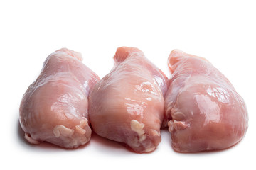 Raw chicken breasts isolated on white background
