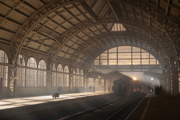 Fototapeta na wymiar Vintage train station with mist