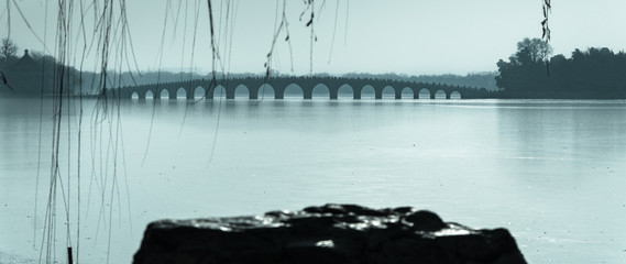  A long bridge of seventeen arches connects two shores on Lake Kunming.