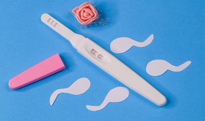 Pregnancy test on a blue background