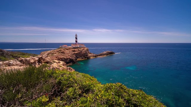 Beautiful lighthouse in sunny day and blue water in summer, Time-lapse
