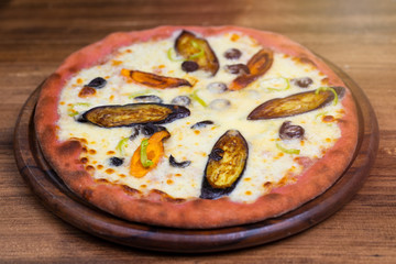 a full vegetarian pizza with beets