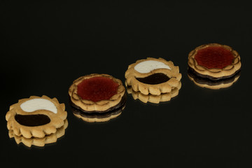 Several marmalade sweets isolated on a black background