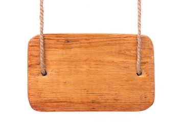 Wooden signpost is hanging on two ropes. Isolated on a white background.