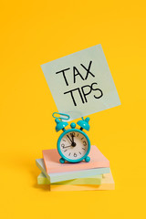 Handwriting text Tax Tips. Conceptual photo compulsory contribution to state revenue levied by...