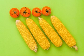 corn and tomatoes seasonal vegetables color concept, products from the market