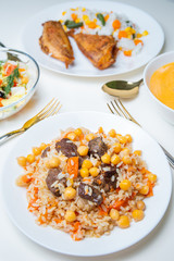 Pilaf and other colorful food on a white background. Food concept. 