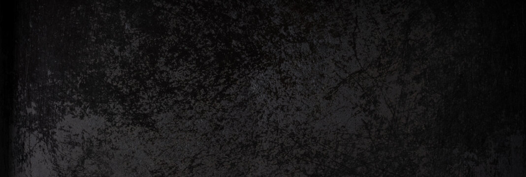 Old black metal surface. Obsolete metallic background