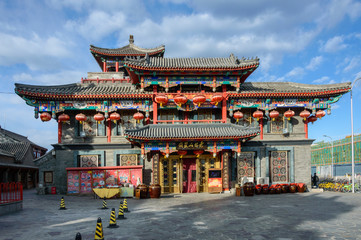 Fototapeta premium A classic Chinese building with numerous decorations in the old Hutongow district.