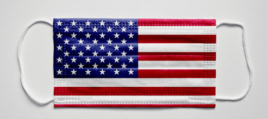 USA flag. Medical mask, Medical protective mask on a white background.Healthcare and medical concept.
