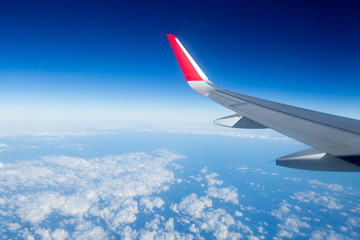 Beautiful clouds with a Boeing window