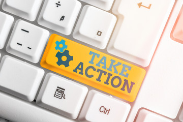 Conceptual hand writing showing Take Action. Concept meaning to do somethingoract in order to get a...