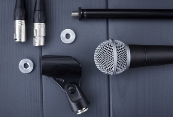 Complete microphone kit with dynamic microphone with black capsule, mic fixing bracket, clamping and adjusting washers, mic stand and xlr connectors